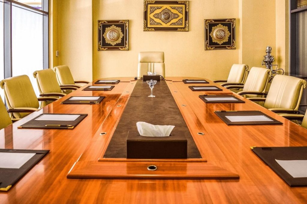 Professional boardroom and meeting room facilities with Islamic wall art at Sapphire Plaza Hotel Doha